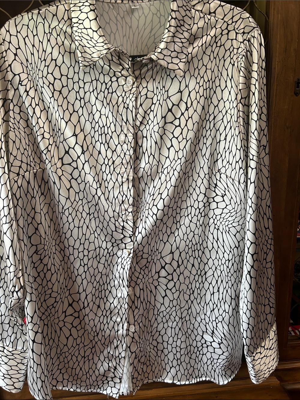 Ladies dressy silky Black & White Patterned Button-Up Shirt, good condition.